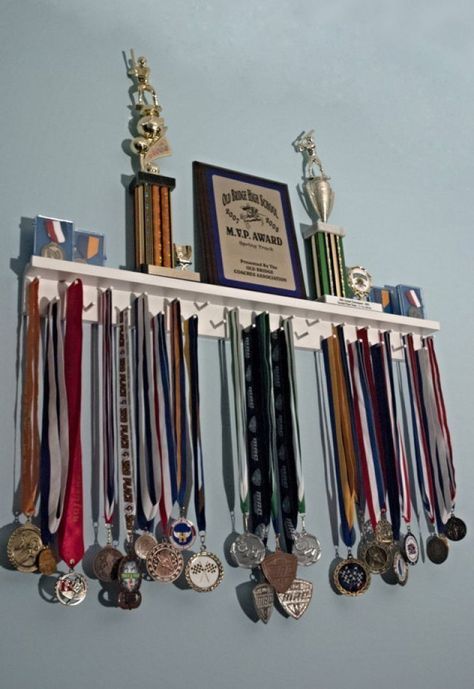 Shelf With Pegs, Johnny Kavanagh, Basketball Trophies, Running Medal Holder, Trophy Shelf, Trophy Display, Running Medals, Award Display, Sports Medals