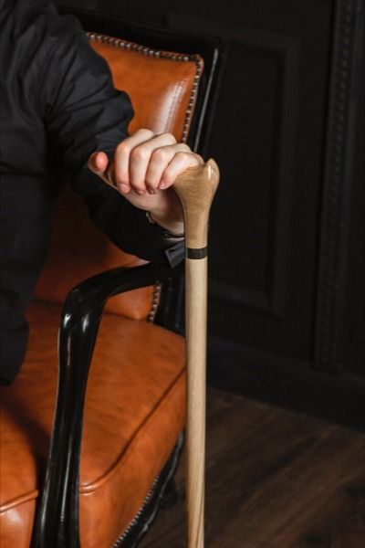 Classic Walking Cane - An Exceptionally Stylish Mobility Aid and Display Piece. Every cane is delicately hand-carved with meticulous attention to detail, transmuting a functional mobility tool into an exceptional walking stick, perfect for enthusiasts of refined elegance and nature-inspired aesthetics. This uniquely stunning item combines the symbol of grace and purity with the comfort and natural allure of expertly hand-carved wood. Cane Aesthetic, Walking With A Cane, Cane Cane, Handmade Walking Sticks, Walking Staff, Walking Aids, Grace Symbol, Wooden Canes, Wooden Walking Sticks