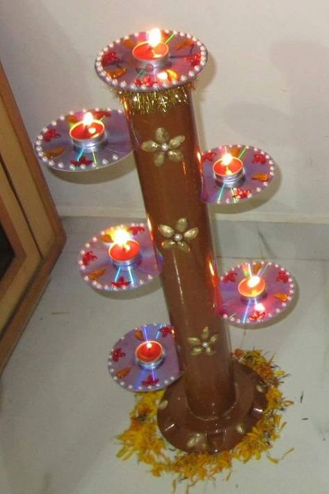 Diwali and festival is meant to be cerebrated with lots of light,here are great lighting projects which you can create by Recycle Old CD's For Diwali Lights Cd Crafts Diy, Old Cd Crafts, Cd Diy, Diwali Decorations At Home, Old Cd, Diwali Lights, Old Cds, Diy Diwali Decorations, Cd Crafts