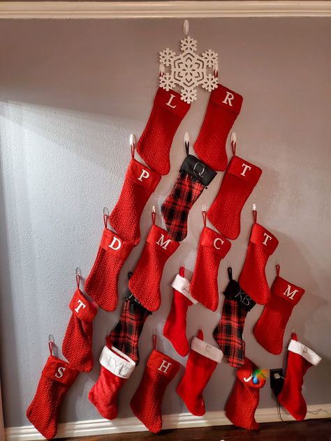 Christmas Stocking Wall Decor, Christmas Stocking On Wall, Alternative Christmas Stocking Ideas, Large Family Stocking Hanging Ideas, Hanging Christmas Stockings On Wall, Creative Ways To Hang Stockings On Wall, Stocking Display Ideas, Stocking Wall Ideas, How To Decorate Stockings For Christmas