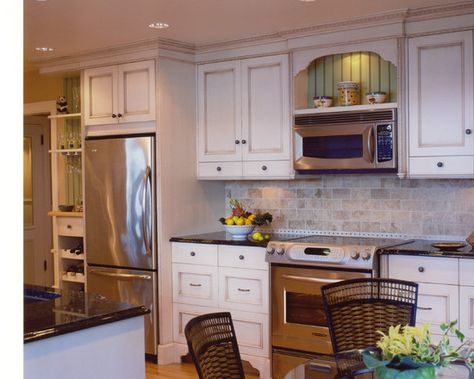 Over The Range Microwave Design...I like the bead board back and the shelf. A good solution to hide the vent hood. Microwave Cabinet, Mediterranean Kitchen, Microwave In Kitchen, Kitchen Cabinets Makeover, Kitchen Stove, Up House, Kitchen Upgrades, Trendy Kitchen, Kitchen Redo