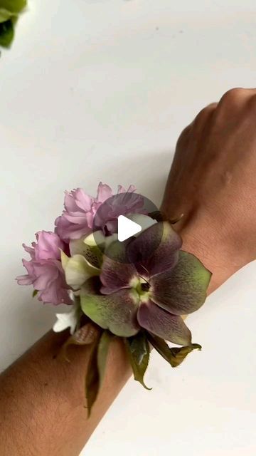 Wollam Gardens on Instagram: "@tint.floral using bits and bobs on our farm to make a DIY cuff style wrist corsage. A perfect homemade gift for mom that honors the beauty of Earth🌍  #floralstyling #flowersofinstagram #underthefloralspell #floraldesign #localflowers #hellebores #flowertips #farmerflorist #wristcorsage #earthday" Homemade Corsage Wrist, How To Make A Wrist Corsage, How To Make A Corsage Wristlet, How To Make A Corsage, Diy Corsage Wristlet, Homemade Gift For Mom, Corsage Wedding Mother, Corsage Diy, Diy Wrist Corsage