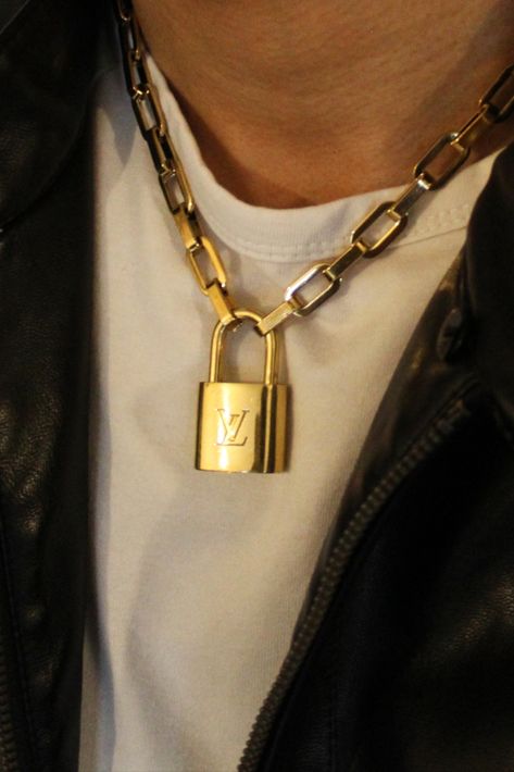 Authentic LV repurposed Lock: Stylish, elegant and luxurious, our men's jewellery collection is finally here. It marries original designs and a classic yet modern signature style .. Lock Necklace Men, Louis Vuitton Lock Necklace, Lv Lock Necklace, Bracelets Outfit, Repurposed Necklace, Opening A Boutique, Interlocking Ring, Vintage Burberry, Lock Necklace