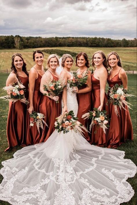 Rust Country Wedding Colors for 2024, Rust Bridesmaid Dresses, Rust Wedding Bouquets - ColorsBridesmaid Fall Boho Wedding Inspiration, Country Wedding Dress Ideas, Country Themed Wedding Dress, Rustic Orange Bridesmaid Dresses, Rust Wedding Bouquets, Rust Wedding Party, Rust Color Wedding, Western Wedding Colors Schemes, Khaki Groom