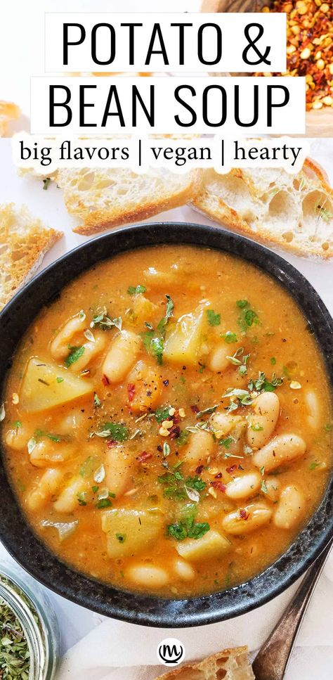 This potato and bean soup is hearty and full of protein. It's a budget-friendly recipe that uses pantry staples and makes a simple yet delicious lunch or dinner, perfect for warming you up.#beanrecipes #whitebeansoups #vegansouprecipes #healthysouprecipes #comfortfood Potato Bean Soup, Hearty Vegetarian Soup, Butter Bean Soup, Pinto Bean Soup, Chicken Broth Recipes, Vegetarian Soup Recipes, Bean Soup Recipes, Stewed Potatoes, Vegan Soup Recipes