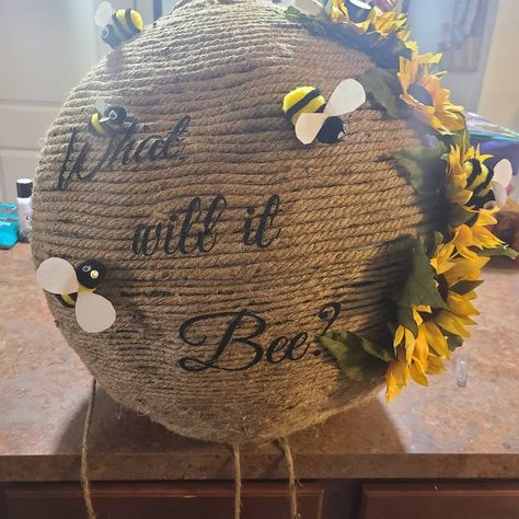 "What Will It Bee?" themed gender reveal beehive piñata handmade. Honey Bee Themed Gender Reveal, Bee Hive Gender Reveal Pinata, What Could It Bee Gender Reveal, Bee Themed Gender Reveal Ideas, Honeycomb Gender Reveal, Bee Theme Gender Reveal Party Decorations, Bumble Bee Gender Reveal Party Ideas, What Will It Bee Gender Reveal Decor, Gender Reveal Ideas Bee