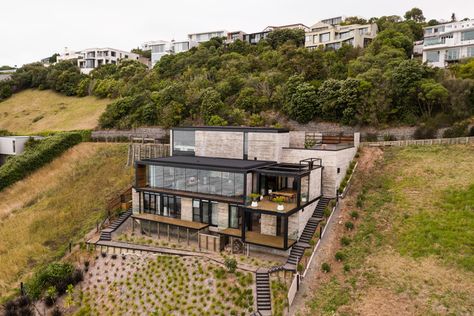 Concrete was a necessity on the very steep, geotechnically challenging site, so we chose to embrace it. Slope House Design, House On Slope, Cedar Shiplap, Sloping Lot House Plan, Slope House, Hillside House, Clerestory Windows, H Design, Casa Exterior