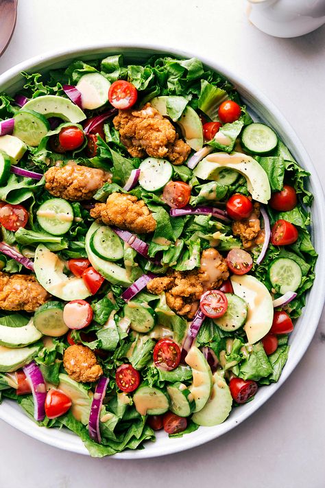 Our favorite crispy chicken salad with an easy (5-ingredient) honey BBQ dressing. This salad can be made in 25 minutes or less with a few short-cuts! Spicy Chicken Salad Recipe, Bbq Dressing, Green Salad With Chicken, Salad Challenge, Homemade Chicken Strips, Crispy Chicken Salads, Salads Recipes For Dinner, Salad Aesthetic, Crispy Chicken Tenders