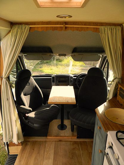 Small table between front seats. Camper Van Kitchen, Kombi Motorhome, Small Camper, Camping 101, Kombi Home, Van Conversion Interior, Van Life Diy, Campervan Interior, Camper Van Conversion Diy