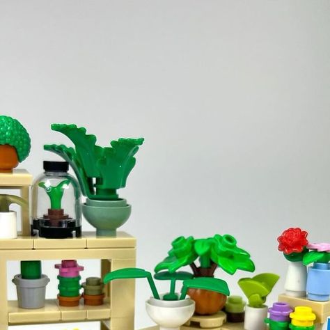 Jesse on Instagram: "Plant Shop 🌱 Here are most of the interior builds for my upcoming plant store 🪴 Including a wide range of merchandise like a terrarium, chia pet, succulents, venus flytrap, cacti, terracotta pots, and more! Which is your favorite? 🌵🌿🌼 . . . . #lego #afol #plant #plantshop #legomoc #legomodular #modular #plantlover #legocity #legotown #plants #legostore #venusflytrap #chia #terrarium #legoshop #legohouse #minifig #farmersmarket #legocreator #legofurniture #legobuilding #seeds" Chia Terrarium, Lego Plant Pot, Lego Plants Ideas, Lego Terrarium, Lego Plants, Lego Botanical, Mini Creations, Lego Diy Crafts, Lego Masters