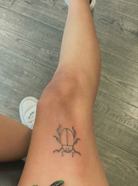 Small beetle tattoo (no more than 2 inches) on thigh Small Beetle Tattoo, Small Leg Tattoo, Scarab Beetle Tattoo, Small Thigh Tattoos, Beetlejuice Tattoo, Indie Tattoo, Taboo Tattoo, Beetle Tattoo, Bug Tattoo