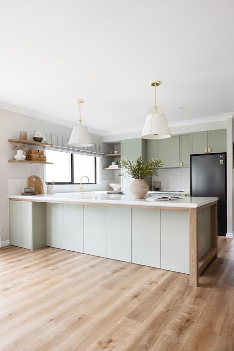 Modern farmhouse kitchen featuring gorgeous green cabinetry Green White Timber Kitchen, Kitchen Design Peninsula, Ydl Stone, Beach Shack Kitchen, Prime Oak Woodmatt, White And Timber Kitchen, G Shaped Kitchen, Style Curator, Prime Oak