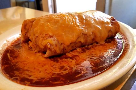 Easy Wet Burrito Recipe: A Drool-Worthy Ground Beef Baked Burrito Recipe | Mexican Recipes | 30Seconds Food Easy Wet Burrito Recipe Ground Beef, Burrito Deluxe Recipe, Wet Burrito Recipe Ground Beef, Easy Wet Burrito Recipe, Wet Burrito Recipe, Chilaquiles Casserole, Wet Burrito Recipes, Baked Burritos, Beef Burrito Recipe