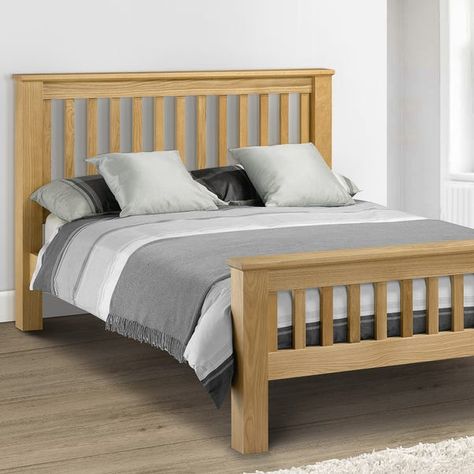 * Solid oak construction * Sprung slatted base- for added support and comfort * Timeless slatted headboard and low footboard. For a homely yet modern wooden bed frame, look no further than the Amsterdam Oak Bed. Its robustness is proof that the bed frame makes use of traditional design values, and its contemporary twist on the farmhouse look emphasises its modern nature. Attractive and dependable in equal measure, this bed frame would look great in most bedroom settings.Please note, unfortunately we cannot deliver this item to the Channel Islands. Wooden Double Bed Frame, Oak Double Bed, Super King Bed Frame, Wooden Double Bed, Oak Bed Frame, Oak Bed, Black Bed Frame, Steel Bed Frame, Oak Beds