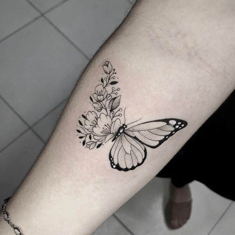 medium-sized black and grey tattoo on woman's forearm of butterfly with one floral wing Butterfly With Flowers, Butterfly With Flowers Tattoo, Butterfly Tattoo Meaning, Tato Henna, Small Butterfly Tattoo, Butterfly Tattoos For Women, Forearm Tattoo Women, Memorial Tattoo, Shoulder Tattoos For Women