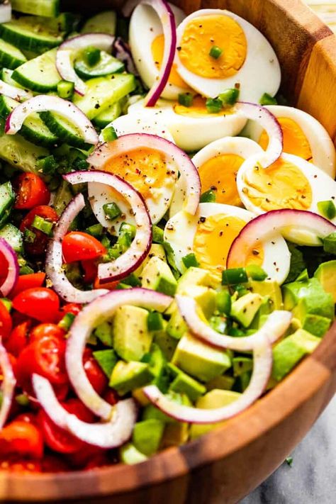 This easy Chopped Egg, Cucumber and Tomato Salad is a fresh take on egg salad with bright cherry tomatoes, diced avocado, curly slices of fresh red onion, English cucumber and a tangy homemade Dijon vinaigrette! Boil Shrimp, Salad Calories, Beautiful Salads, Boiled Egg Salad, Homemade Cheese Crackers, Salad Appetizer Cups, Tomato Egg, Homemade Buttercream, Tuna And Egg