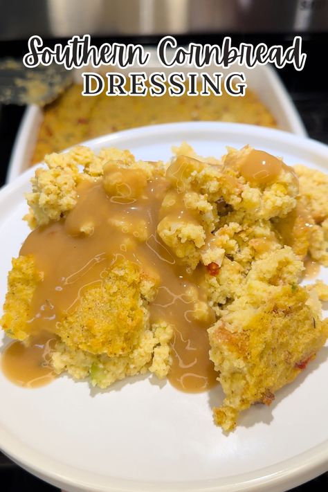 Perfectly seasoned southern cornbread dressing, a timeless comfort food with rich flavor and a fluffy texture. The ideal side dish for your holiday meals or family gatherings. Southern Dressing Recipe Cornbread Thanksgiving, Gravy For Cornbread Dressing, Slow Cooker Cornbread Dressing, Southern Dressing Recipe Cornbread, Crockpot Dressing Cornbread, Moist Cornbread Dressing, Southern Meal Ideas For Dinner, Southern Dressing Recipe, Holiday Cornbread