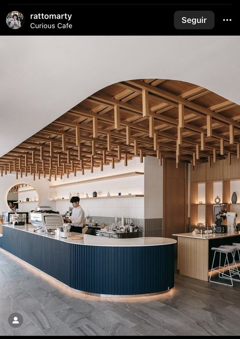 Long Bar Design, Restaurant Ceiling Design Cafe Interiors, Trendy Store Design, Cafe Island Counter, Cafe Column Design, Contemporary Cafe Interior Design, Curved Cafe Counter, Coffee Shop Ceiling Design, Bakery Counter Design