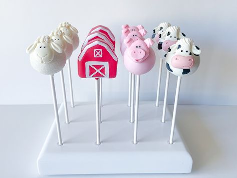 Simple and cute Farm theme Cake Pops 🐷🐮🐑❤️ I think the Cow is my favorite!🐄 Inspo from the talented @ballzycakes #farmcakepops #cakepops #farmanimals #pigcakepop #cowcakepops #sheepcakepop #barncakepop #farmthemebirthday #treatmaker Farm Cake Pops, Cow Cake Pops, Farm Animal Cake Pops, Farm Theme Cake, Pig Cake Pops, Barn Birthday Party, Animal Cake Pops, Barn Cake, Cow Cake