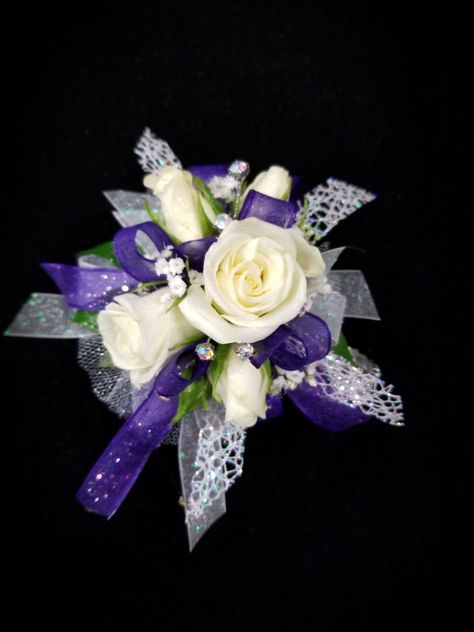 White spray roses with purple and irresdescent accents Purple And White Corsage And Boutonniere, Purple And Gold Corsage, Gold Corsage, Corsage Ideas, Prom Corsages, White Spray Roses, Bridesmaid Corsage, Prom Corsage, Corsage Prom