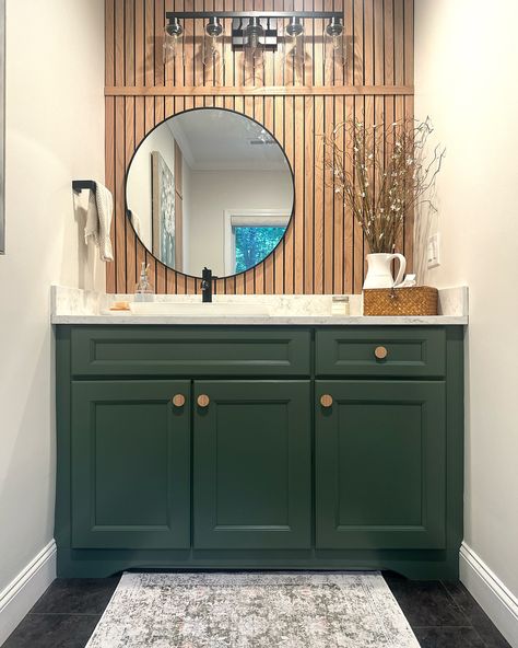 Comment SHOP below to receive a DM with the link to shop this post on my LTK ⬇ https://liketk.it/4JRGy PAINT makes the biggest impact! I painted my vanity in this mini bathroom makeover and it made ALL the difference. . What I used: Paint-custom color match in @benjaminmoore Advance Slat Wall- @weaberlumber solid oak slats Fixtures and accessories- Find these in my LTK. The link is in my bio . #bathroommakeover #diyhomeprojects #diyhomedecor #diydecor #bathroomupdate #paintedfurniture... Green Vanity Bathroom Ideas Paint, Bathroom Vanity Paint Ideas, Mini Bathroom, Green Vanity, My Vanity, Wood Slat Wall, Bathroom Update, Slat Wall, Painting Bathroom