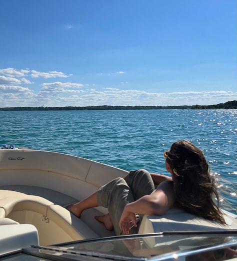 a girl is seated in a speedboat. she looks out over the water. On The Boat Pictures, Speed Boat Photoshoot, Speedboat Aesthetic, Speed Boat Aesthetic, Boating Aesthetic, 2025 Vison, Sailing Aesthetic, Boat Photoshoot, Boat Girl