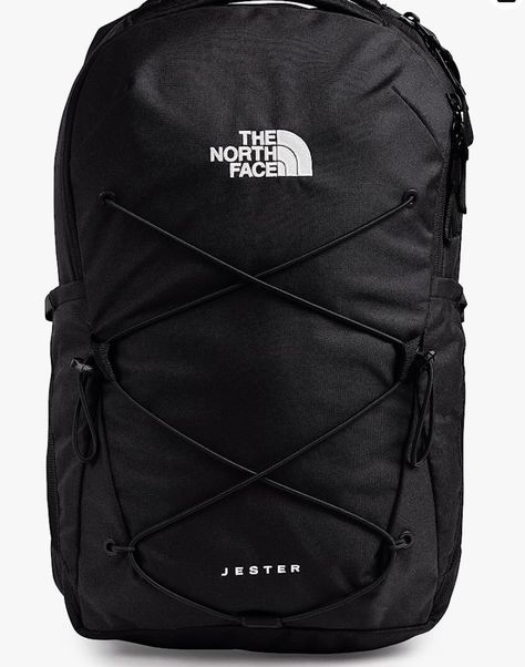 The ultimate pack for a day out features a 15" laptop sleeve, women-specific shoulder straps and a feature-rich layout. A large main compartment hold books and binders while a front elastic bungee system provides external storage Northface Backpacks, Black North Face Backpack, North Face Backpacks, The North Face Jester, Jester Backpack, What's In My Backpack, North Face Jester, Occasion Shoes, Shoe Boutique