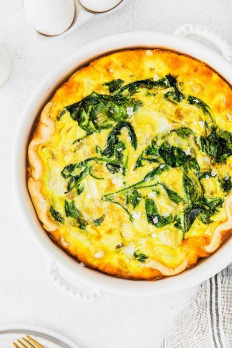 Spinach and Artichoke Quiche | Table for Two® | Bloglovin’ Artichoke Quiche Recipes, Spinach Artichoke Quiche, Artichoke Quiche, Grain Free Dessert Recipes, Artichoke And Spinach, Spinach Quiche Recipes, Roasted Artichoke, Quiche Recipes Easy, Grain Free Desserts