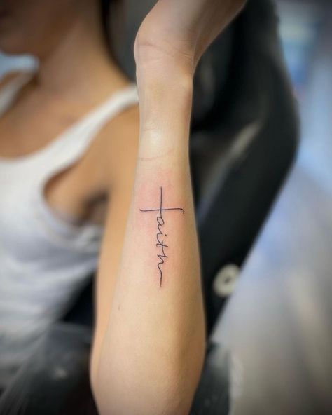 Faith tattoo — what can it be, what symbols are behind it and how to choose a design? We have prepared an entire article where we explained all the symbolism and collected the best ideas for such tattoos for you. Have Faith Tattoo, Aesthetic Tattoos Arm, Faith Tattoo Ideas, Tattoos For Someone Who Passed, Women Tattoos Ideas, Faith Cross Tattoos, Back Of Neck Tattoos For Women, Faith Tattoo Designs, Tattoos Aesthetic