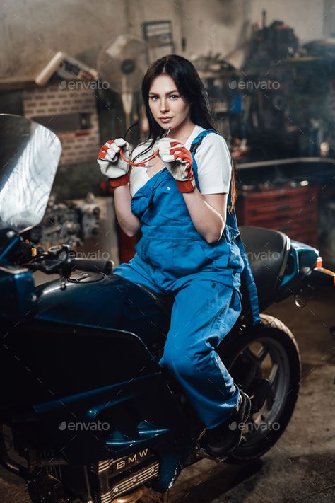 Young brunette female mechanic in blue overalls sitting on sportbike in garage or workshop by fxquadro. Beautiful young brunette female mechanic in blue overalls sitting on sportbike in garage or workshop #Sponsored #mechanic, #blue, #overalls, #Young Female Mechanic, Mechanic Overalls, Brunette Female, Female Aesthetic, Woman Mechanic, Blue Overalls, Sport Bikes, Yearbook, Overalls