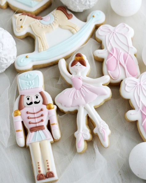 It’s almost Nutcracker season! Or as I like to call it... "Ballet But Make It Pastel" season. These cookies bring sugar-plum sweetness to your holiday vibes—complete with a nutcracker who looks like he’s here for the snacks, a ballerina who’s got her pirouette game on point, and a rocking horse that’s just along for the ride. #NutcrackerCookies #DancePartyInYourMouth #HolidayMagic #EdibleBallet Nutcracker Gender Reveal, Nutcracker Cookies Decorated, Ballet Party Theme, Sugar Plum Fairy Aesthetic, Nutcracker Party Ideas, Nutcracker Ballet Party, Nutcracker Season, Nutcracker Christmas Party, Nutcracker Cookies