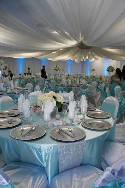 Close up table setup, linens, and overlay Blue Tablecloth, Blue Table, Christmas Table Settings, Chair Cover, Chair Covers, Christmas Dinner, 18th Birthday, Christmas Table, Shades Of Blue