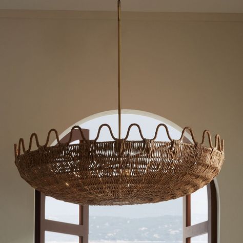 Laura kirar’s playfully theatrical natural lampakanay rope is woven into palm forms – as seen with mar floor lamp and mar pendant chandelier - call to mind the classic era of the 1930’s in the coastal south of france. Held together by an iron rod finished in antique brass. Kirar pays homage to the details of casually curated mediterranean interiors with their influences of aged formal furniture, the micro-climate combinations of tropical plants and pines, the passion for all things exotic from c All Of The Lights, Arteriors Home, Pendant Chandelier, South Of France, Coastal Style, Shop Lighting, Contemporary Interior, Interior Lighting, Gold Material