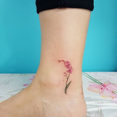 Orchid Flower Tattoos, Tiny Flower Tattoos, Flower Spine Tattoos, Orchid Tattoo, Ankle Tattoos For Women, Mom Tattoo Designs, Blossom Tattoo, Dainty Tattoos, Subtle Tattoos