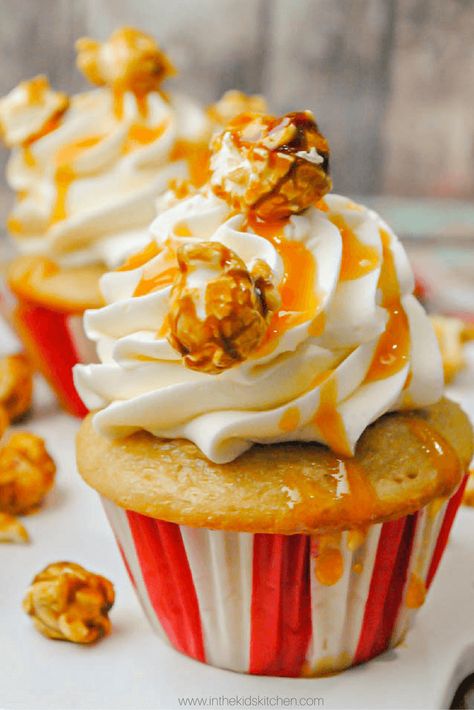 Caramel Popcorn Cupcakes, perfect for a Circus Birthday Party or Baseball Birthday Party. An easy vanilla butter cake topped with homemade caramel buttercream, caramel popcorn and caramel syrup - the perfect caramel dessert Popcorn Cupcakes, Carnival Birthday Party Theme, Carnival Food, Halloween Party Snacks, Popcorn Party, Movie Night Party, Circus Birthday Party, 12 Cupcakes, Carnival Birthday Parties