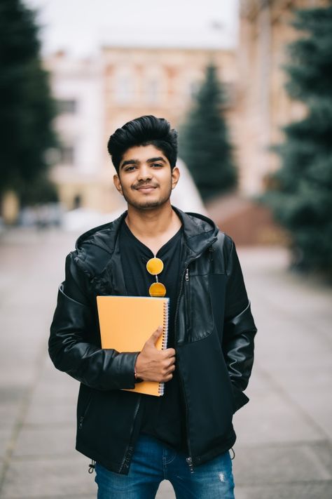 Handsome young indian student man holdin... | Free Photo #Freepik #freephoto #business #vintage #car #music Student Images, Student Photo, Make Funny Faces, Blue Suit Men, College Boys, People Having Fun, Indian People, Millennials Generation, Men Photoshoot