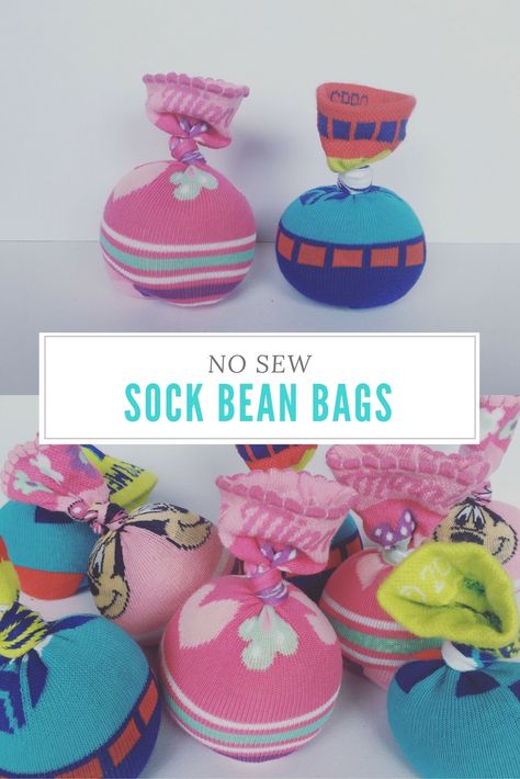 Here’s something fun to do with all those single socks, or if kids have outgrown them: make sock bean bags. Sock bean bags are fun for all kinds of things. Toddler Fun Great for toddlers (supervision Bean Bag Activities, Fairy Party Games, Camping Party Games, Toddler Bean Bag, Baby Birthday Games, Diy Bean Bag, Toddler Party Games, Bean Bag Games, Baby Bean Bag