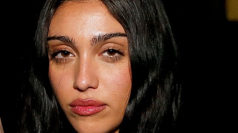 Madonna's daughter Lourdes Leon rocked a thong bikini and knee-high boots for a new photoshoot that will make you look twice Lourdes Madonna, Shredded Dress, Madonna Daughter, The Face Magazine, Famous Moms, Guy Ritchie, Long Dark Hair, Celebrity Kids, Black Tulle