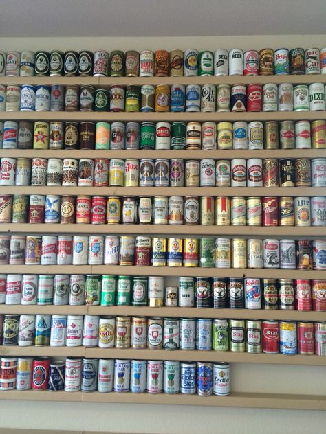 Vintage beer cans, shelved Beer Can Collection Display Ideas, Beer Can Display Ideas, Beer Shop Design, Beer Bottle Display, Billiards Room Decor, Can Collection, Barn Bar, Beer Display, Craft Beer Shop