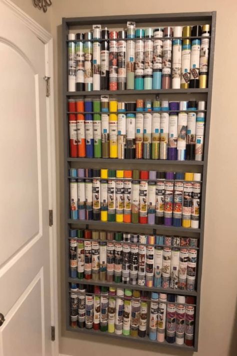 Craft Room Cricut Organization, Vynal Storage Ideas, Cricut Supply Storage, Circuit Vinyl Storage, Cricut Vinyl Organization, Storing Cricut Vinyl Rolls, Cricut Material Storage, Vinyl Craft Storage, Organize Vinyl Rolls