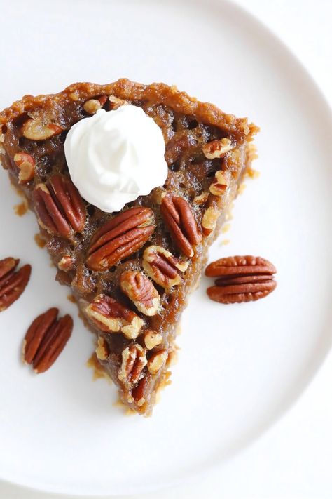 Indulge in the rich and nutty flavors of this delicious gluten-free crustless pecan pie! With no crust, the focus is entirely on the sweet, caramelized pecans filling that's perfect for those following a gluten-free lifestyle. This recipe is simple to make and sure to impress your guests at any gathering. Enjoy a slice of this decadent pecan pie paired with a dollop of whipped cream or vanilla ice cream for the ultimate dessert experience. Crustless Pecan Pie Gluten Free, Gf Pecan Pie Recipe, No Crust Pecan Pie, Crustless Pecan Pie Recipe, Crustless Pecan Pie, Gluten Free Pecan Pie, Caramelized Pecans, Homemade Pecan Pie, Condensed Coconut Milk