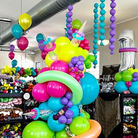 POP POP BALLOON on Instagram: "We went full 80's neon balloons for the 19th anniversary of @simplysocksyarnco . We wanted it to be fun and a little extra.  . We even tried a few new things with this balloon garland including these huge tube looking balloons!  .  If your business is looking to draw some attention then look no further.  . If you are in our near the Fort Wayne Indiana area comment "link" below and we will DM you our info :)  .  #poppopballoonfw #fortwayneballoons #balloongarland #balloonarch #neonballoons #80sparty #80sdesign #neonparty" 80s Balloons, Neon Balloons, 19th Anniversary, 80s Neon, 80s Design, Fort Wayne Indiana, Pop Pop, 80s Party, Neon Party