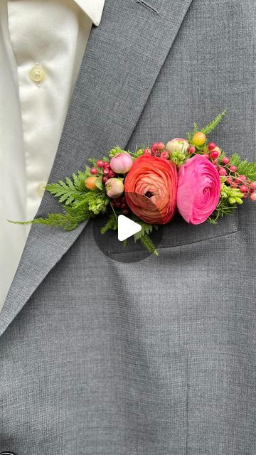 For Floral Sake | Florist Duluth, MN on Instagram: "We are seeing these A LOT this year and we are loving them: Pocket Square Boutonnières! 

These are a great way to add color to a suit, plus they are so easy. Just simply insert the boutonnière into the pocket. No pins! No need to ask for help or search the internet on “how to pin on a boutonnière” 🙃 on your wedding day. Super simple and we’re here for it! 

#pocketsquareboutonniere #pocketsquareboutonnière #mnflorist #mnfloraldesigner #minnesotaflorist #mnwedding #minnesotawedding #weddingboutonniere #mnweddingflorist #wiwedding #wisconsinweddingflowers #duluthmnflorist #duluthflorist #northernmnwedding #northshorewedding #northshoreweddingflorist" Colorful Spring Boutonnieres, How To Make A Pocket Boutonniere, Colorful Pocket Boutonniere, Pocket Square Boutonniere, Pink Orange Boutonniere, Vibrant Boutonniere, Pocket Boutonniere, Floral Pocket Square Boutonniere, Diy Boutonniere Wedding