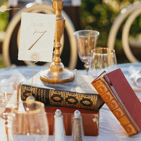 Literature Wedding, Wedding Centerpiece Ideas, Book Centerpieces, Book Themed Wedding, Diy Table Numbers, Literary Themes, Reception Tablescapes, Simple Wedding Centerpieces, Malibu Wedding