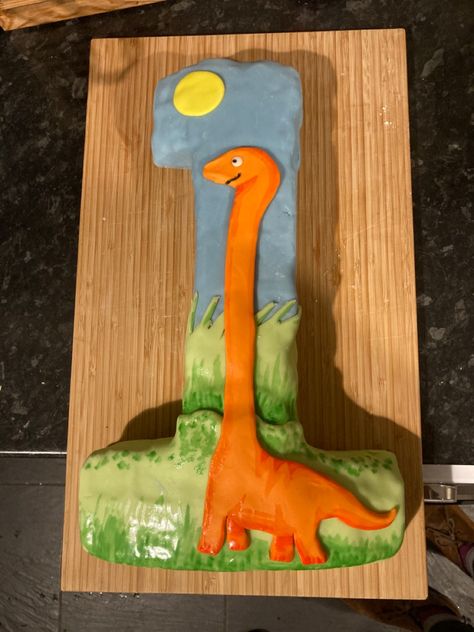 Dinosaur cake in the shape of a number 1 for a first birthday. 1st Bday Cake, Cake Number, Dinosaur First Birthday, Dinosaur Cake, Bday Cake, 1st Birthday Cake, 1st Bday, The Shape, Number 1