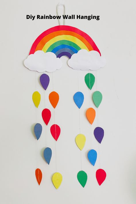 Rainbow Hanging Crafts, Construction Paper Rainbow, Wall Hanging Craft Ideas With Paper For School, How To Make Rainbow, Rainbow Paper Craft, Rainbow Hanging Decor, Rainbow Wall Hanging Diy, Diy Rainbow Wall, Thread Macrame