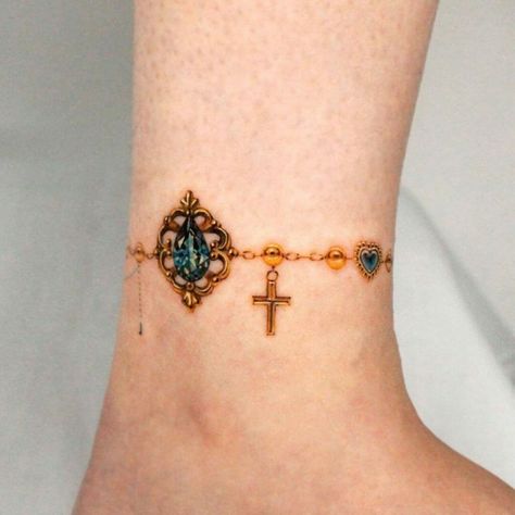 Ankle Rosary Cross Bracelet Tattoo Cross Bracelet Tattoo, Tattoo For Women Ideas, Tattoo Para, Jewelry Tattoo Designs, Tattoo 2022, Wrist Bracelet Tattoo, Charm Tattoo, Gem Tattoo, Ankle Bracelet Tattoo