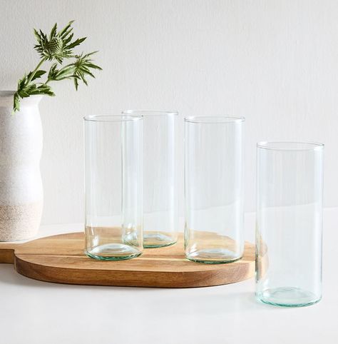 Revel in your own special retreat with the LIBATIONS DRINKING SET. This simple yet luxurious set of four highball and low tumblers are crafted from 100% recycled glass, making it a statement socially and environmentally. Pair the matching carafe (sold separate), to bring the look together adding a sophisticated level of style to any occasion. From weekend gatherings to poolside soirees, you can bring an air of exclusivity to your entertaining with the elegant cylinder of this drinking set. Glass Acrylic Drinkware, The Eden Project, Glass Kitchen Canisters, Kitchen Glassware, Drinking Glass Sets, Drinkware Sets, Eden Project, Drinking Set, Glass Kitchen