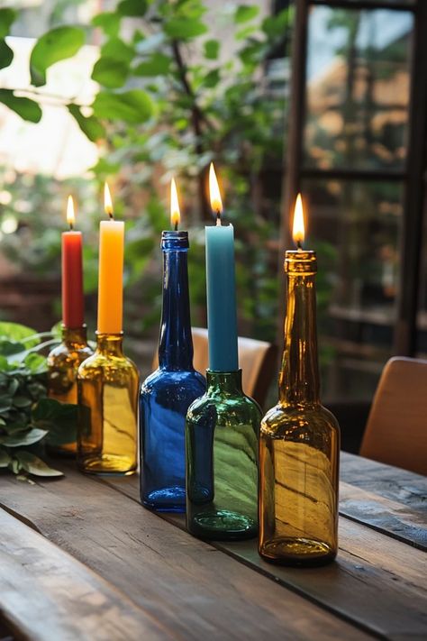 Give new life to your empty wine bottles by transforming them into beautiful candle holders! This DIY project adds a rustic charm to your home decor. 🏡✨ #UpcycledDecor #CandleHolders #DIYHomeProjects #EcoFriendlyCrafts #WineBottleDIY Wine Bottle Repurpose, Empty Wine Bottle Ideas Decor, Repurpose Wine Bottles, Upcycle Wine Bottles, Wine Bottle Candle Holders, Upcycled Candle Holders, Wine Bottle Lamps, Upcycled Wine Bottles, Wine Bottle Candle Holder