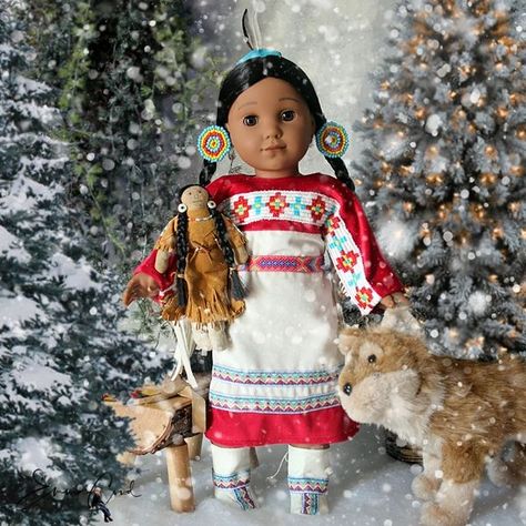 Emma Coud on Instagram: "12 days of Dolly holiday Kaya wanted also to be part of the fun of the holiday photo shooting, so I made her a new pow wow dress to pose with her dog and her little doll. I have hand embroidered the yoke and made the hair ornaments with beads. . #agig #americangirlbrand #americangirldoll #aglove #agadultcollector #18inchdoll #dollstagram #dollphotography #historicalagdolls #aghistorical #kayaatonmy #12daysofdollyholiday" Kaya American Girl, Kaya American Girl Doll, Ornaments With Beads, Native American Dress, American Girl Doll Samantha, Native American Dolls, Doll Patterns Free, American Dress, American Girl Doll Crafts